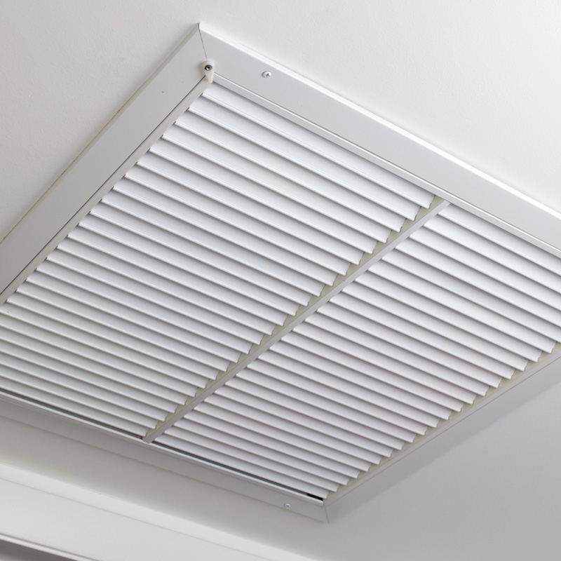 an air return vent on a ceiling